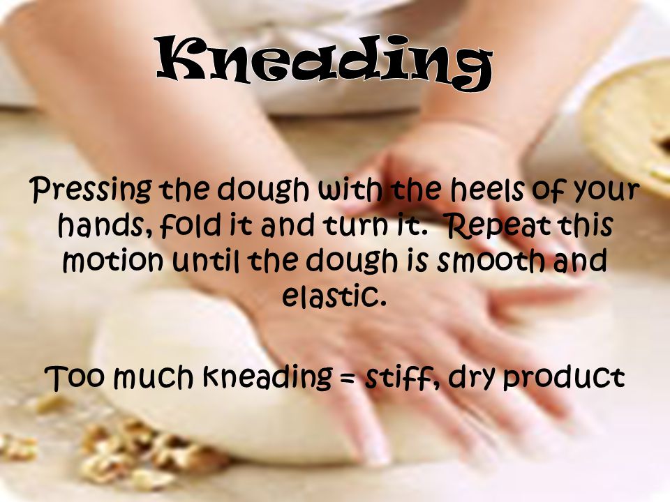 Pressing the dough with the heels of your hands, fold it and turn it.