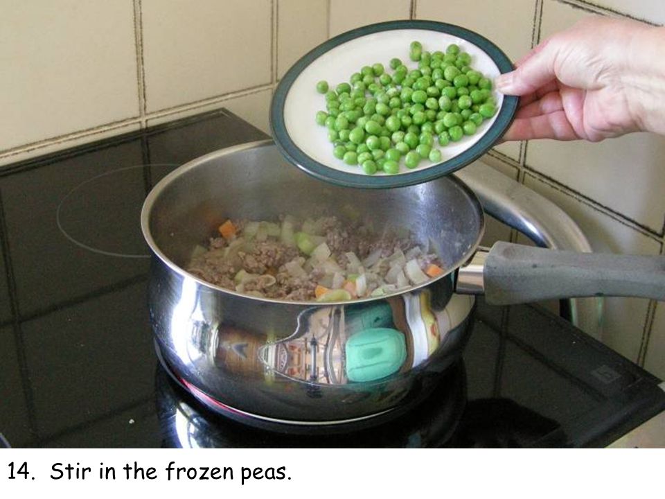 14. Stir in the frozen peas.