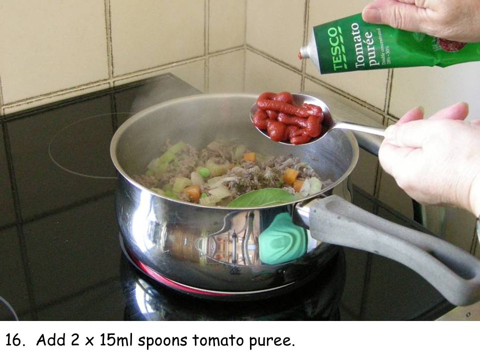 16. Add 2 x 15ml spoons tomato puree.