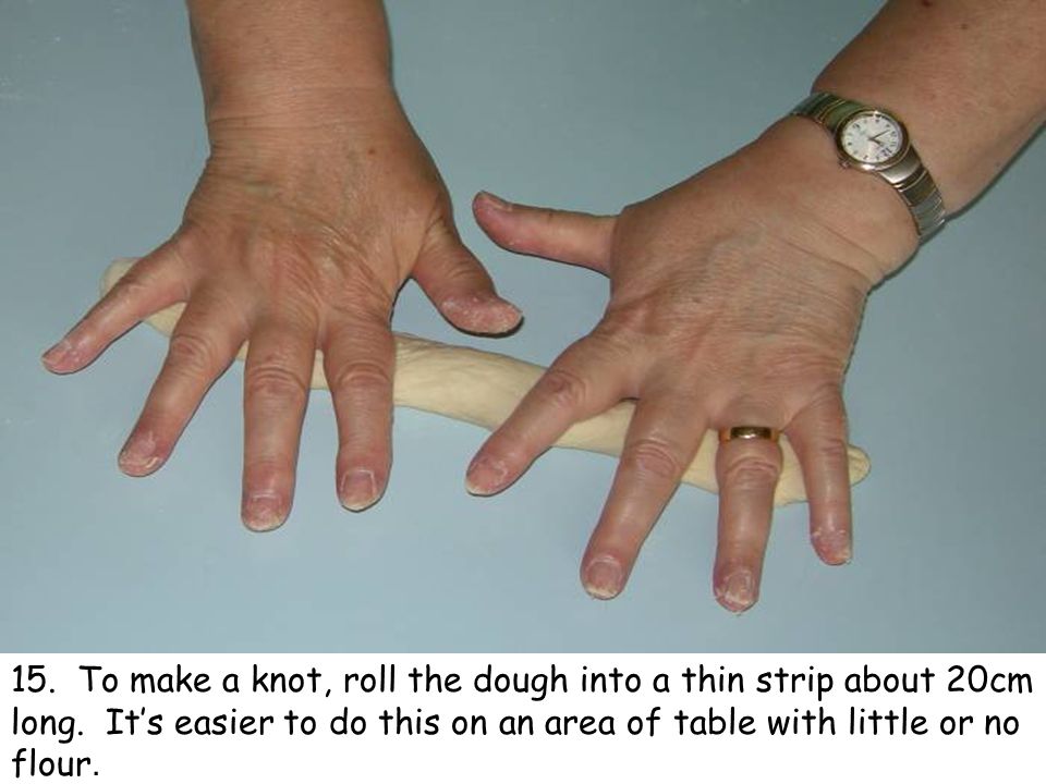 15. To make a knot, roll the dough into a thin strip about 20cm long.