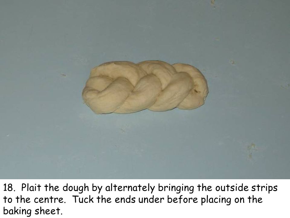 18. Plait the dough by alternately bringing the outside strips to the centre.
