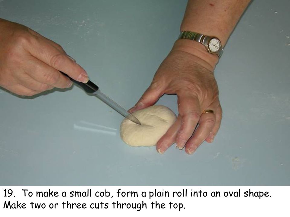 19. To make a small cob, form a plain roll into an oval shape.