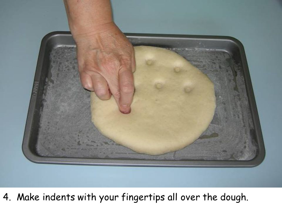 4. Make indents with your fingertips all over the dough.