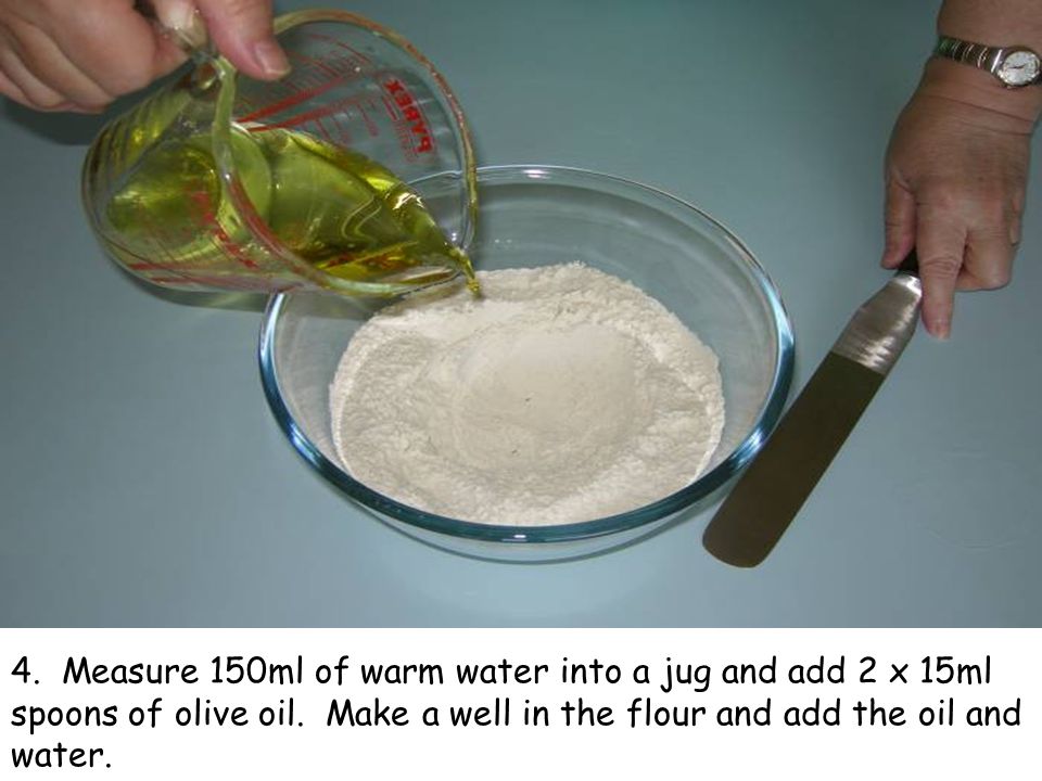 4. Measure 150ml of warm water into a jug and add 2 x 15ml spoons of olive oil.