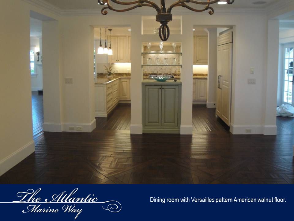 Dining room with Versailles pattern American walnut floor.
