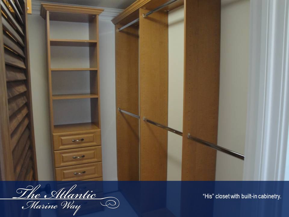 His closet with built-in cabinetry.
