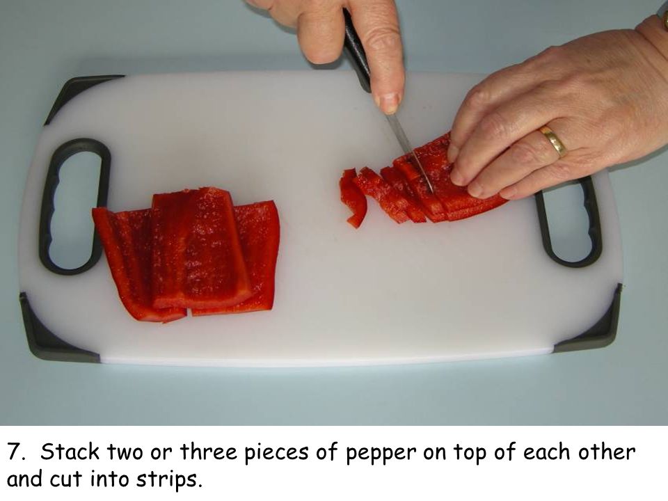 7. Stack two or three pieces of pepper on top of each other and cut into strips.