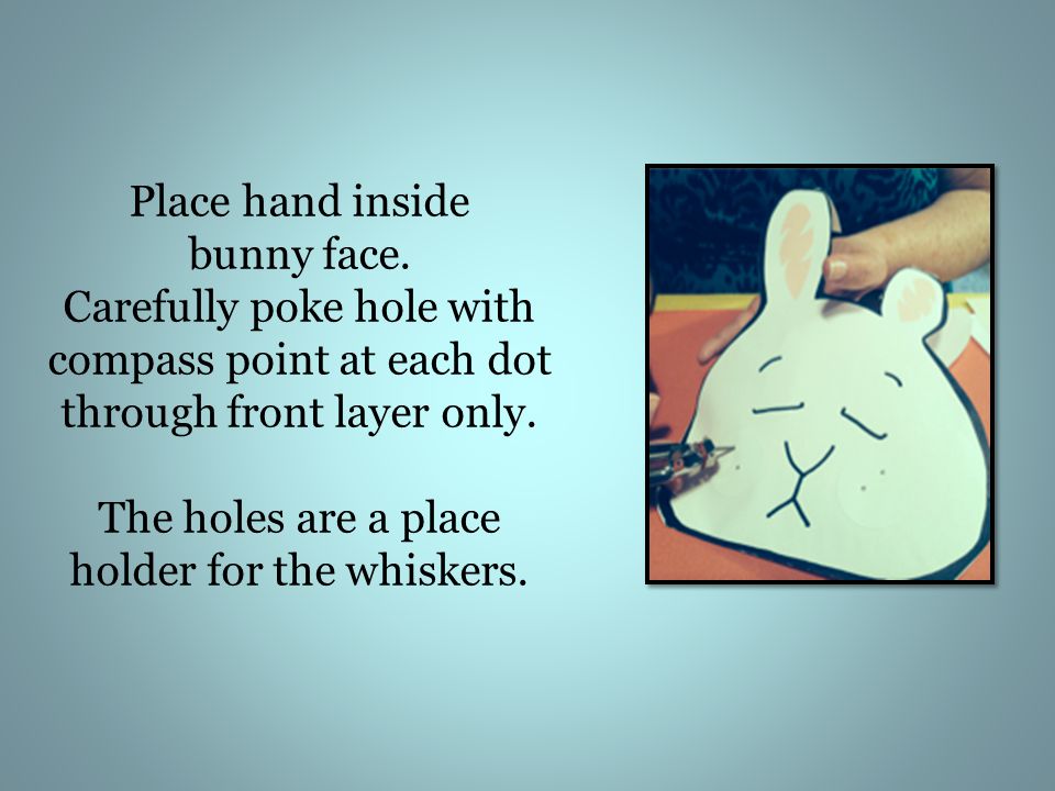 Place hand inside bunny face.