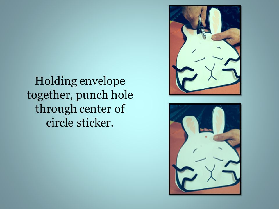 Holding envelope together, punch hole through center of circle sticker.