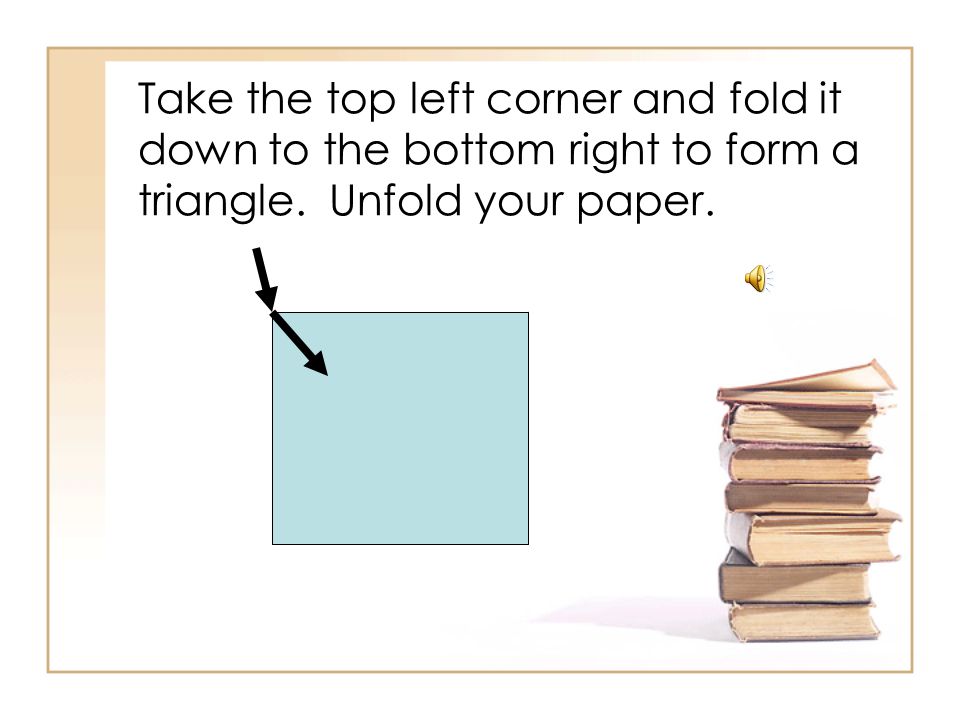 Take the top right corner and fold it down to the bottom left to form a triangle.