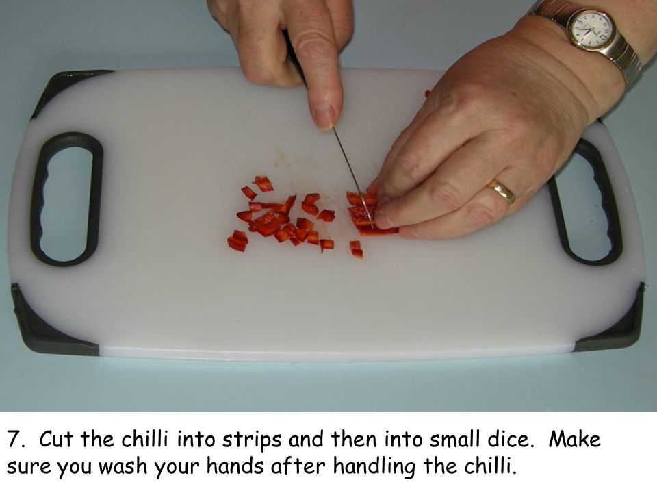 7. Cut the chilli into strips and then into small dice.