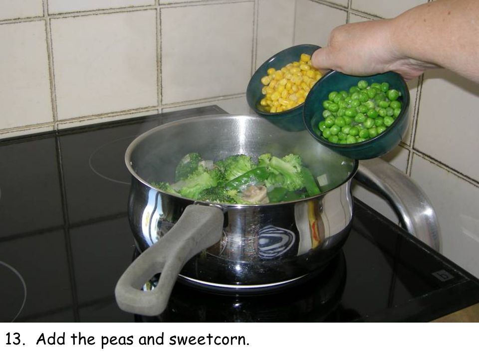 13. Add the peas and sweetcorn.