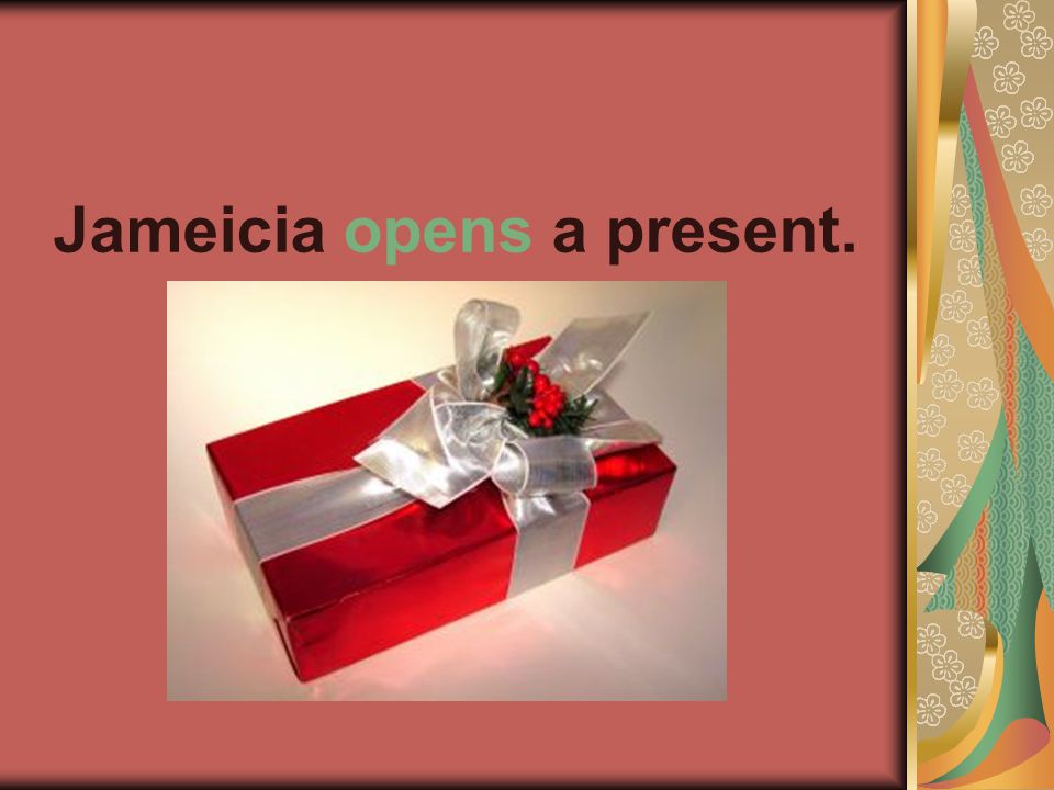 Jameicia opens a present.
