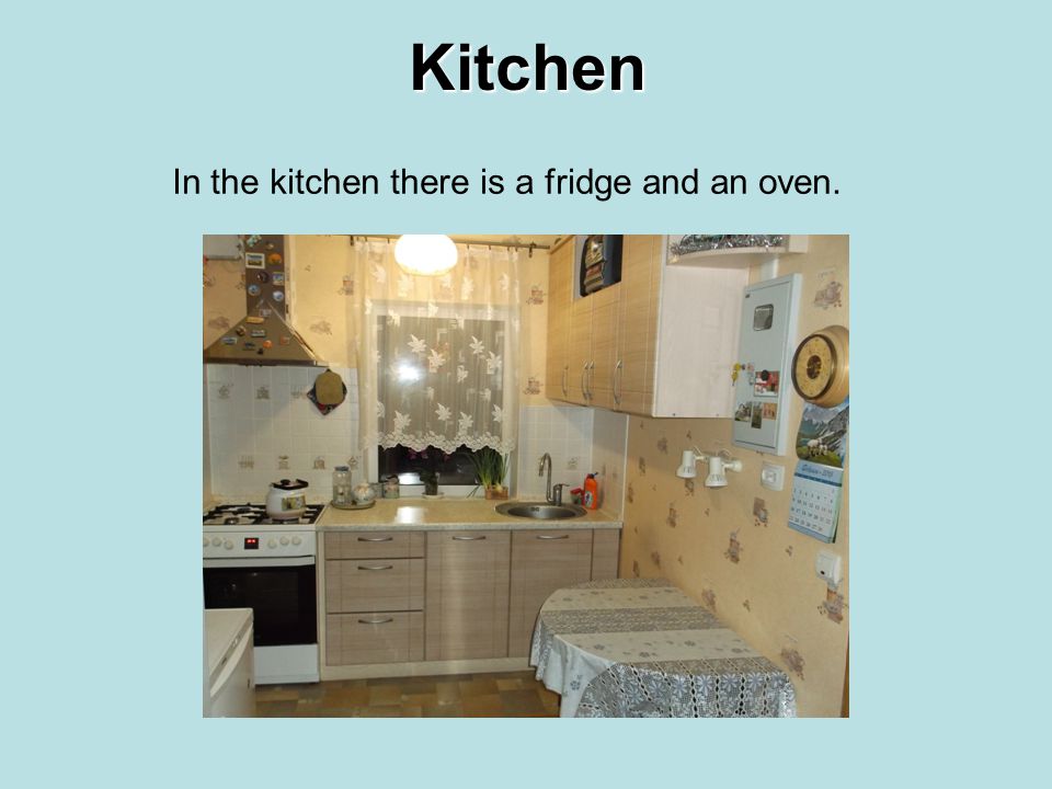 Kitchen In the kitchen there is a fridge and an oven.