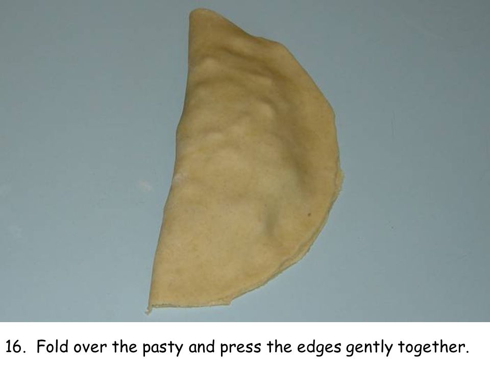 16. Fold over the pasty and press the edges gently together.