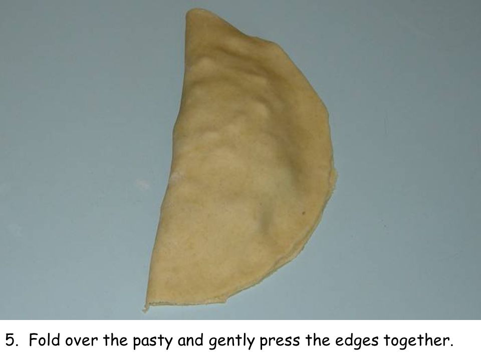 5. Fold over the pasty and gently press the edges together.