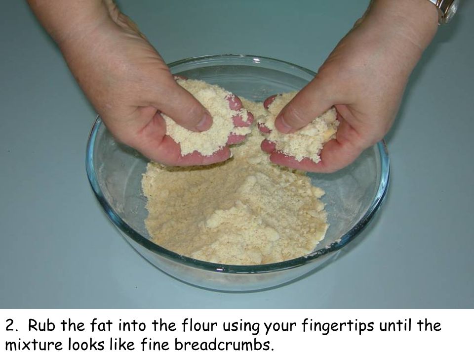 2. Rub the fat into the flour using your fingertips until the mixture looks like fine breadcrumbs.