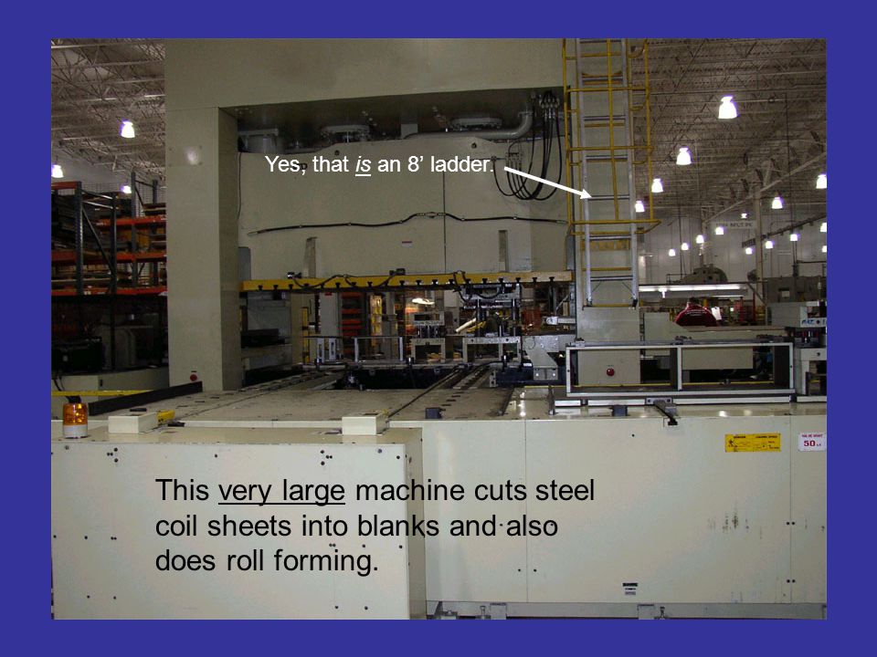 This very large machine cuts steel coil sheets into blanks and also does roll forming.