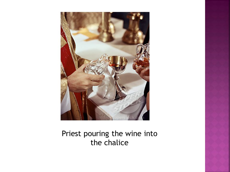 Priest pouring the wine into the chalice
