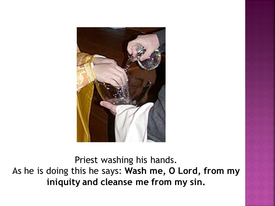 Priest washing his hands.