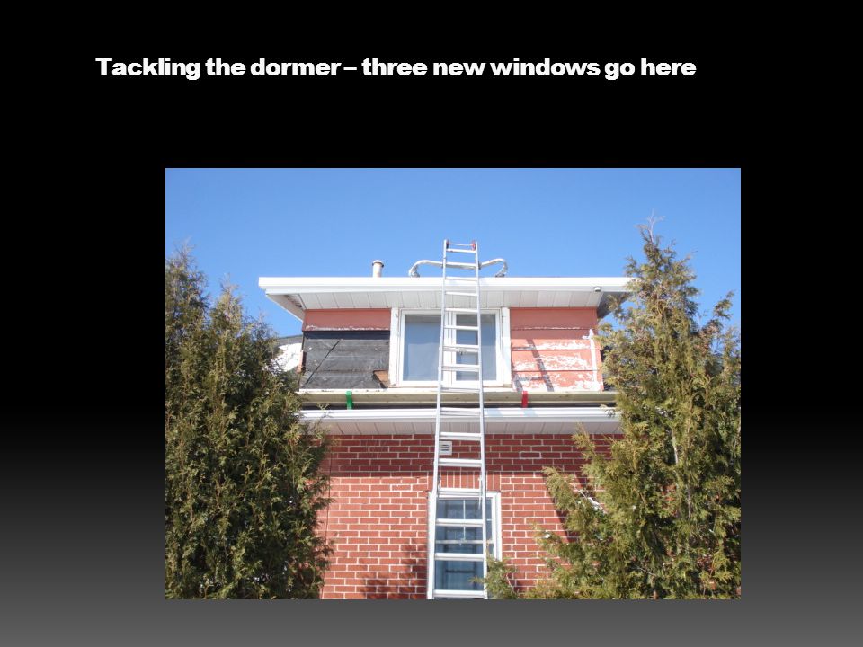 Tackling the dormer – three new windows go here