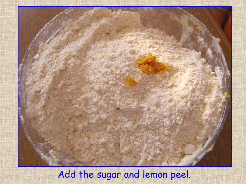 Add the sugar and lemon peel.