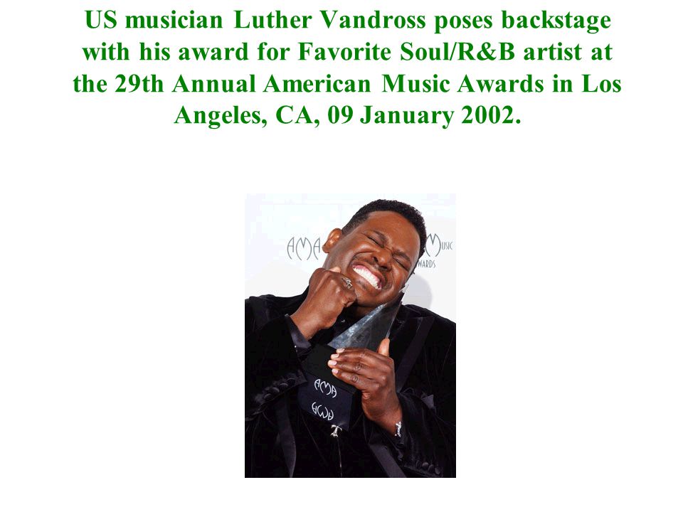 US musician Luther Vandross poses backstage with his award for Favorite Soul/R&B artist at the 29th Annual American Music Awards in Los Angeles, CA, 09 January 2002.