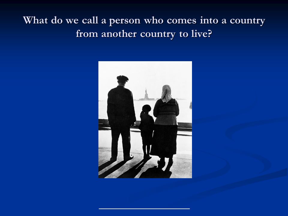 What do we call a person who comes into a country from another country to live.