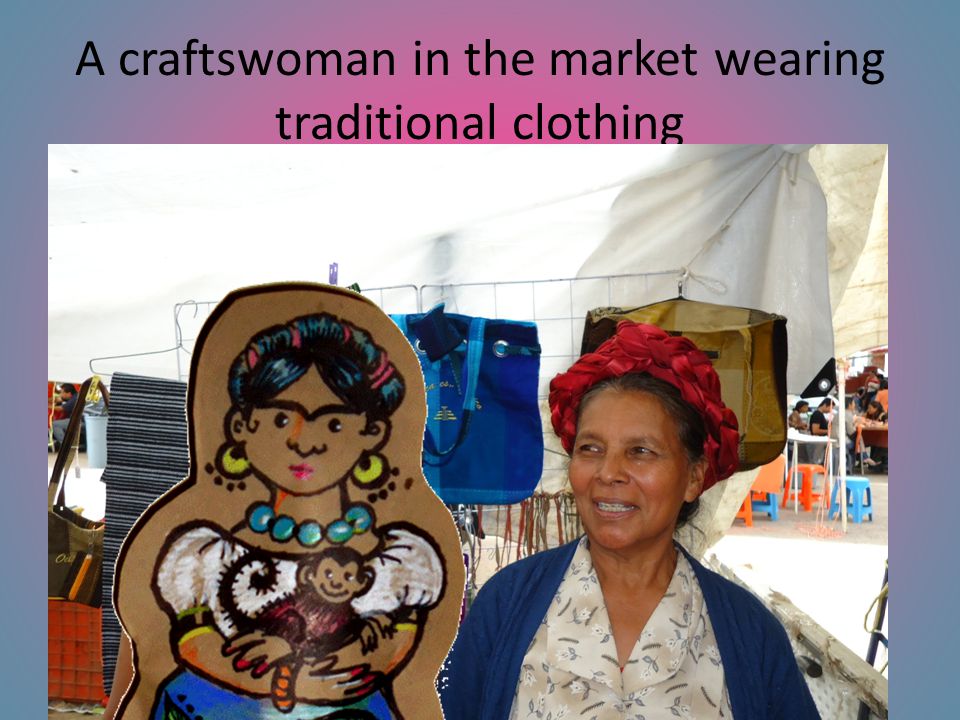 A craftswoman in the market wearing traditional clothing