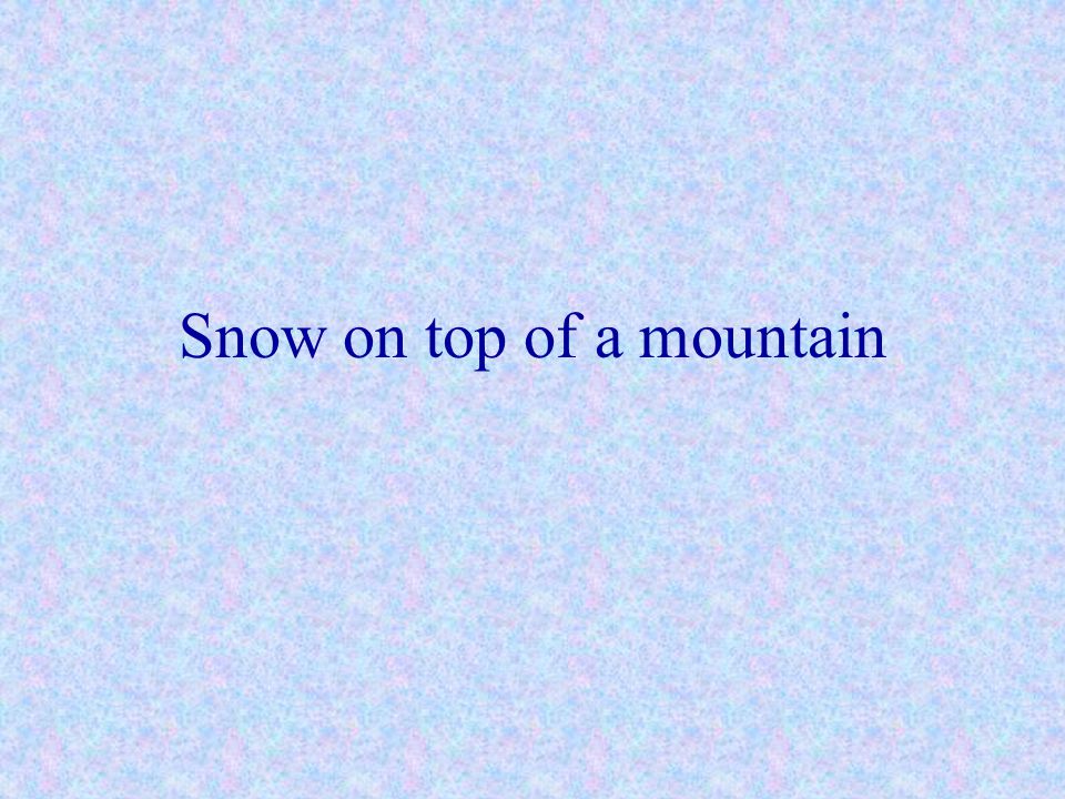Snow on top of a mountain