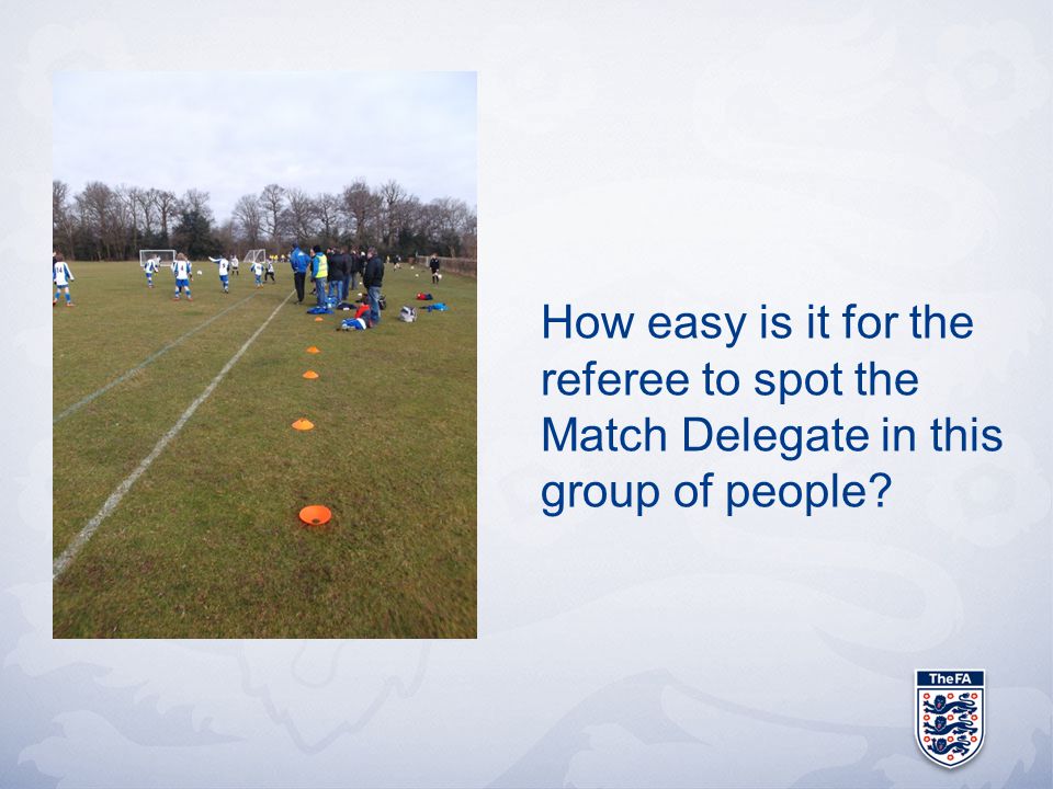 How easy is it for the referee to spot the Match Delegate in this group of people