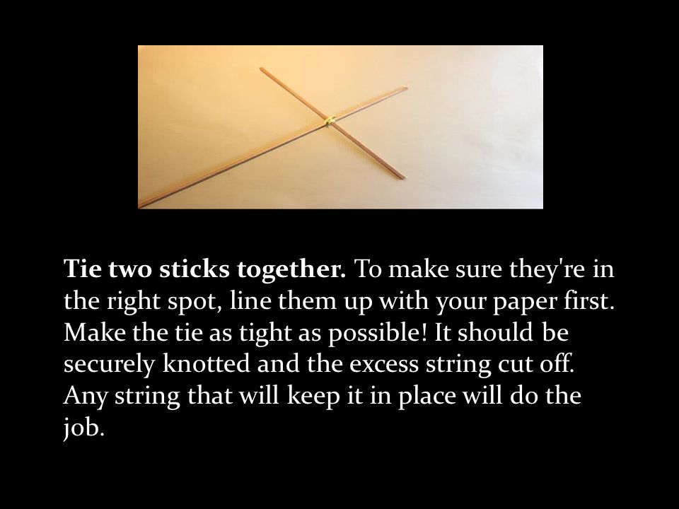 Tie two sticks together.