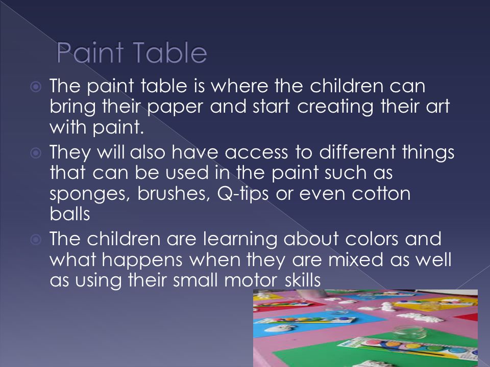  The paint table is where the children can bring their paper and start creating their art with paint.