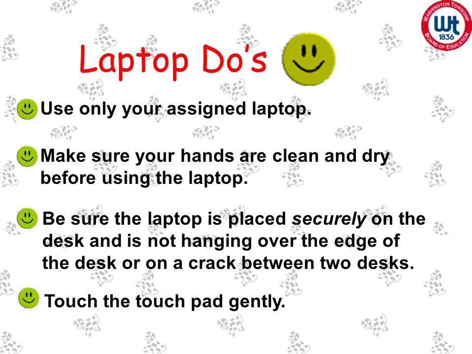 Be sure the laptop is placed securely on the desk and is not hanging over the edge of the desk or on a crack between two desks.