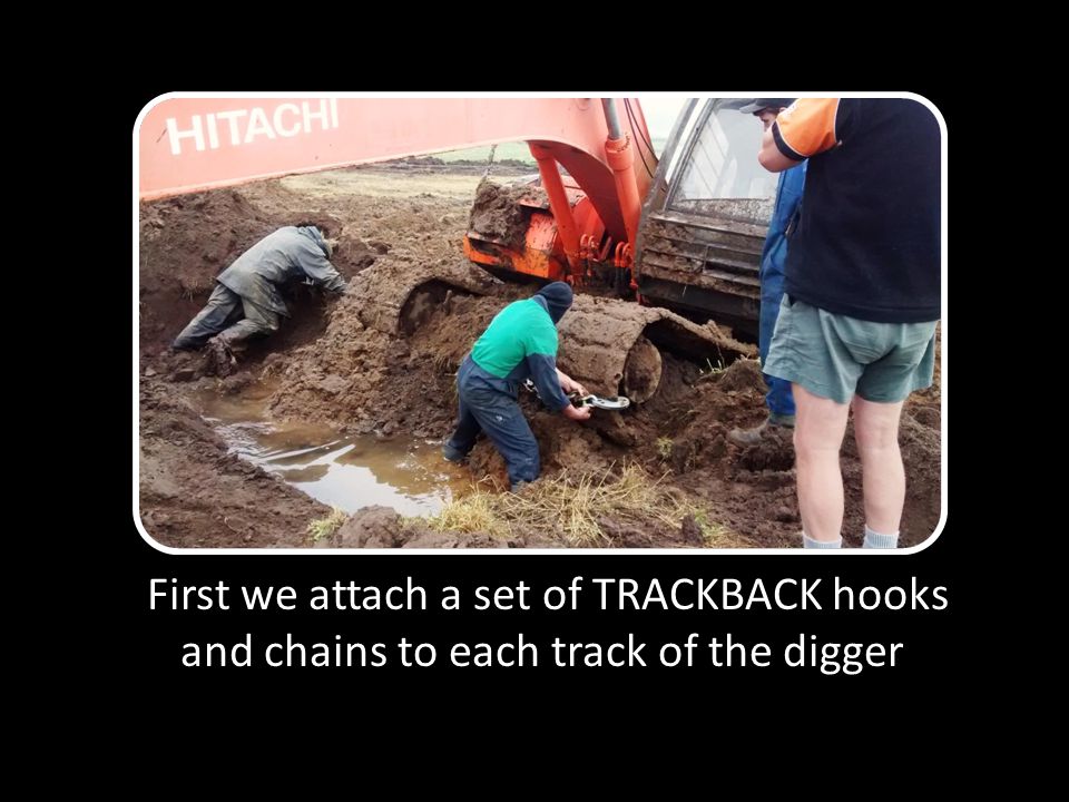 First we attach a set of TRACKBACK hooks and chains to each track of the digger