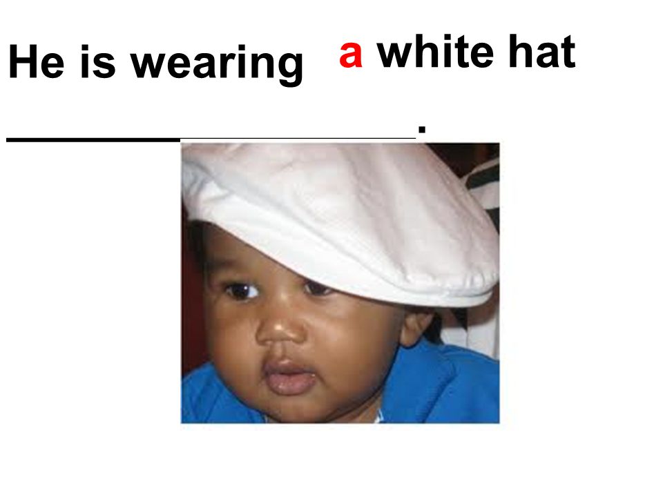 He is wearing ________________. a white hat