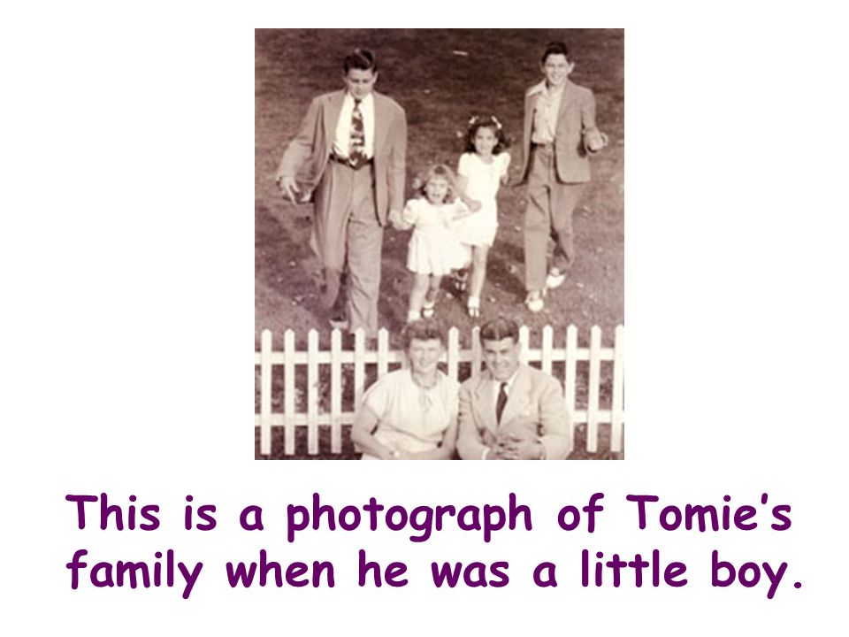 This is a photograph of Tomies family when he was a little boy.