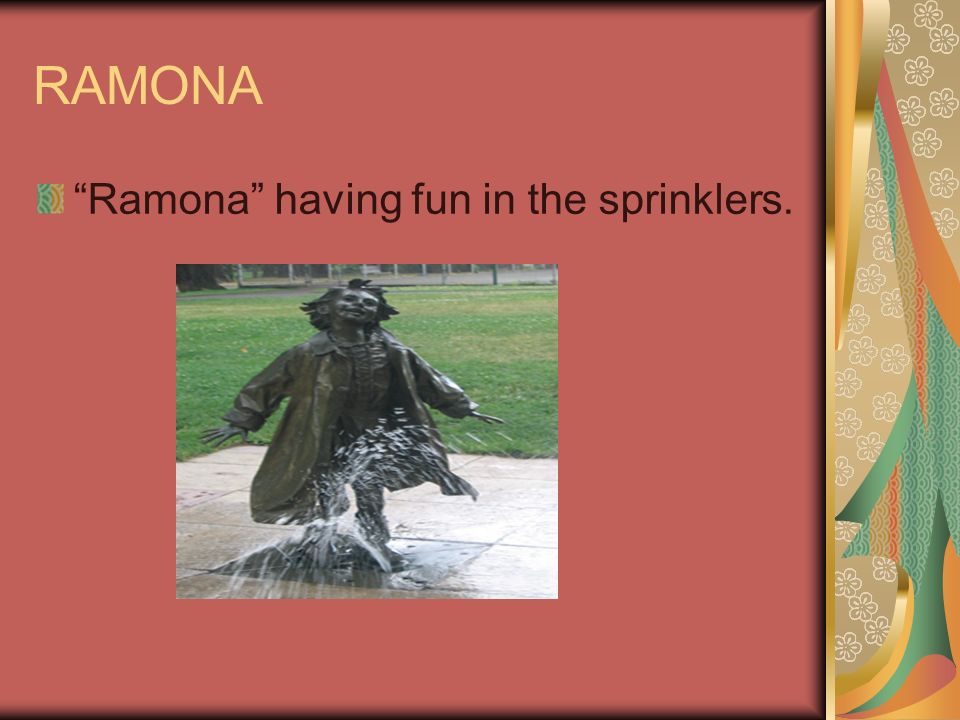 RAMONA Ramona having fun in the sprinklers.