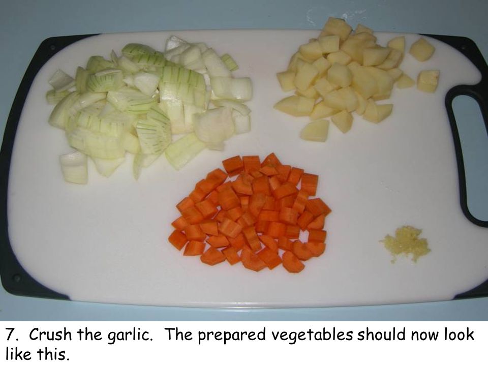 7. Crush the garlic. The prepared vegetables should now look like this.