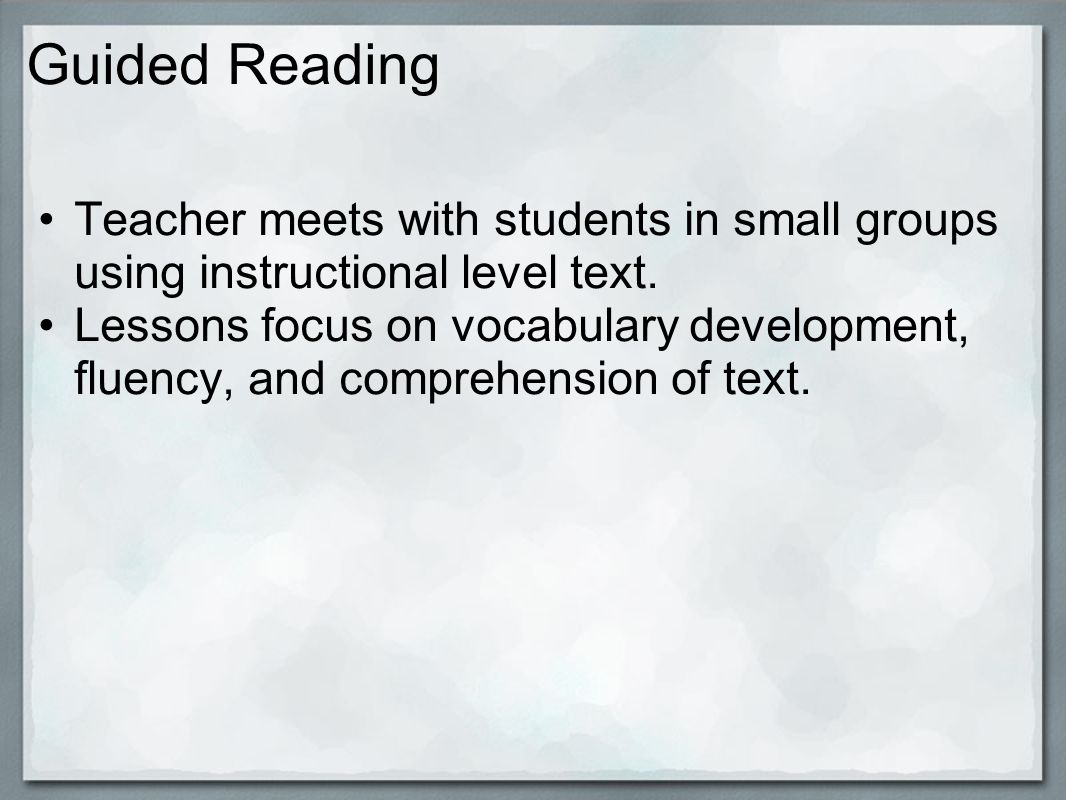 Guided Reading Teacher meets with students in small groups using instructional level text.