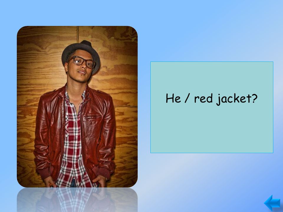 Does he have a red jacket Yes, he does. He / red jacket