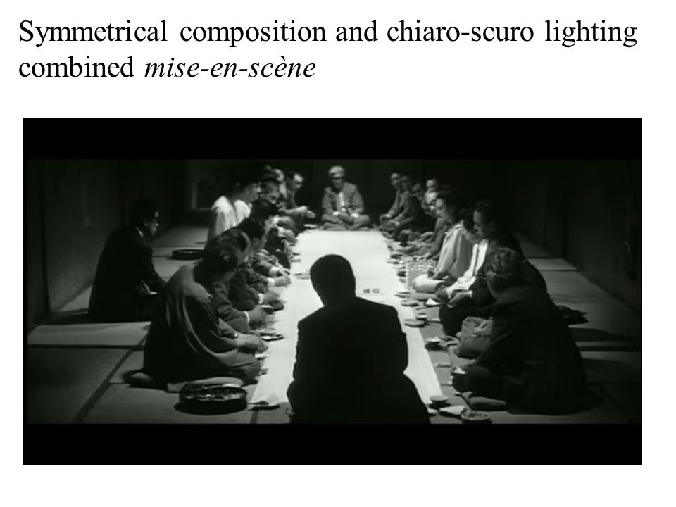 Symmetrical composition and chiaro-scuro lighting combined mise-en-scène