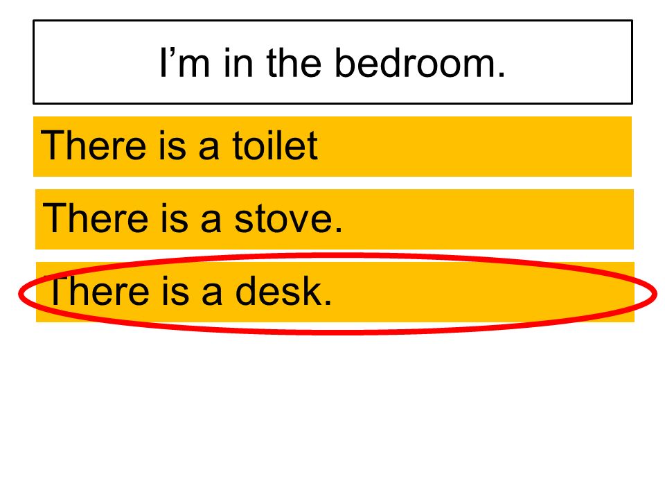 I’m in the bedroom. There is a toilet There is a stove. There is a desk.