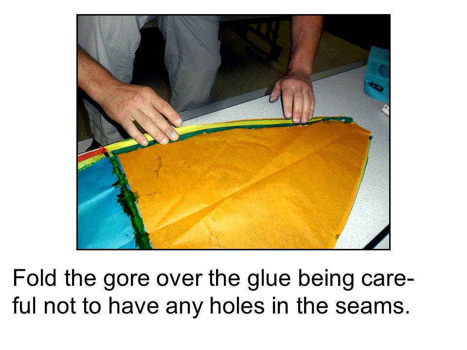 Fold the gore over the glue being care- ful not to have any holes in the seams.