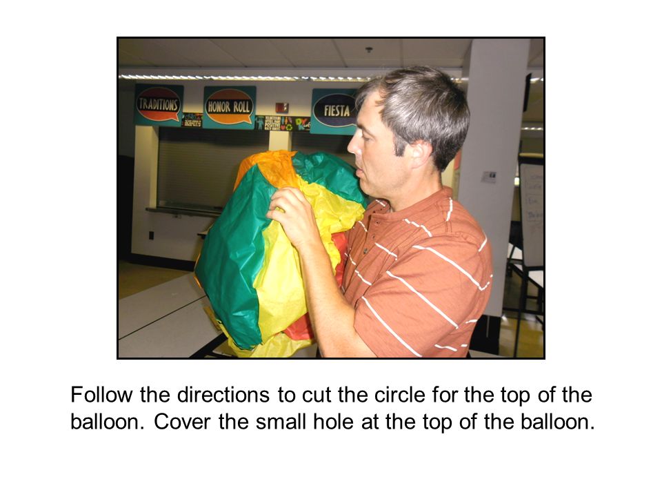 Follow the directions to cut the circle for the top of the balloon.