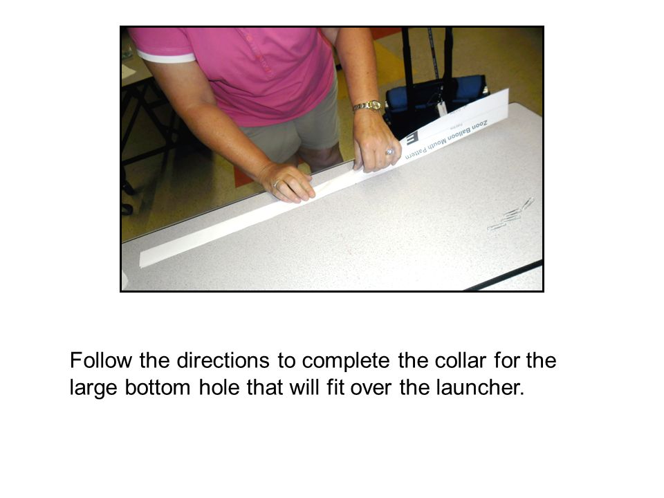 Follow the directions to complete the collar for the large bottom hole that will fit over the launcher.