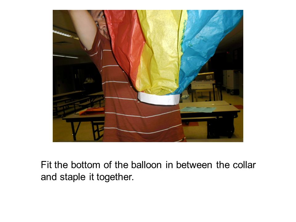 Fit the bottom of the balloon in between the collar and staple it together.