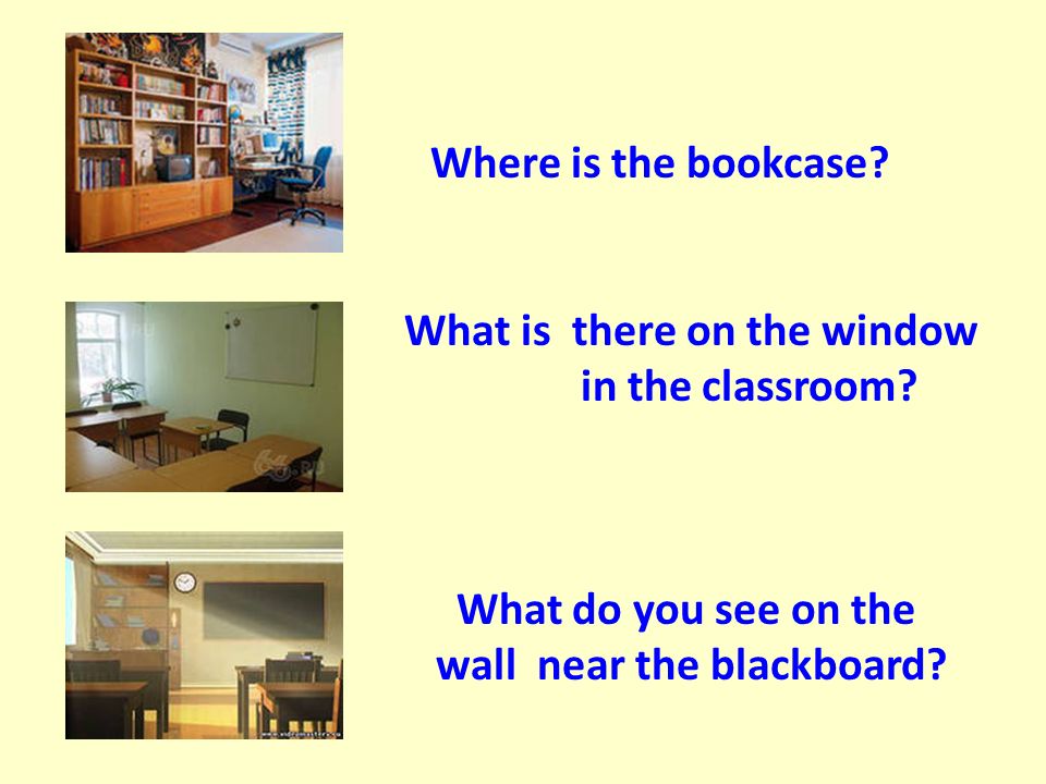 Where is the bookcase. What is there on the window in the classroom.