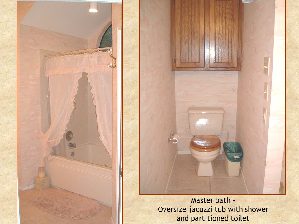 Master bath – Oversize jacuzzi tub with shower and partitioned toilet