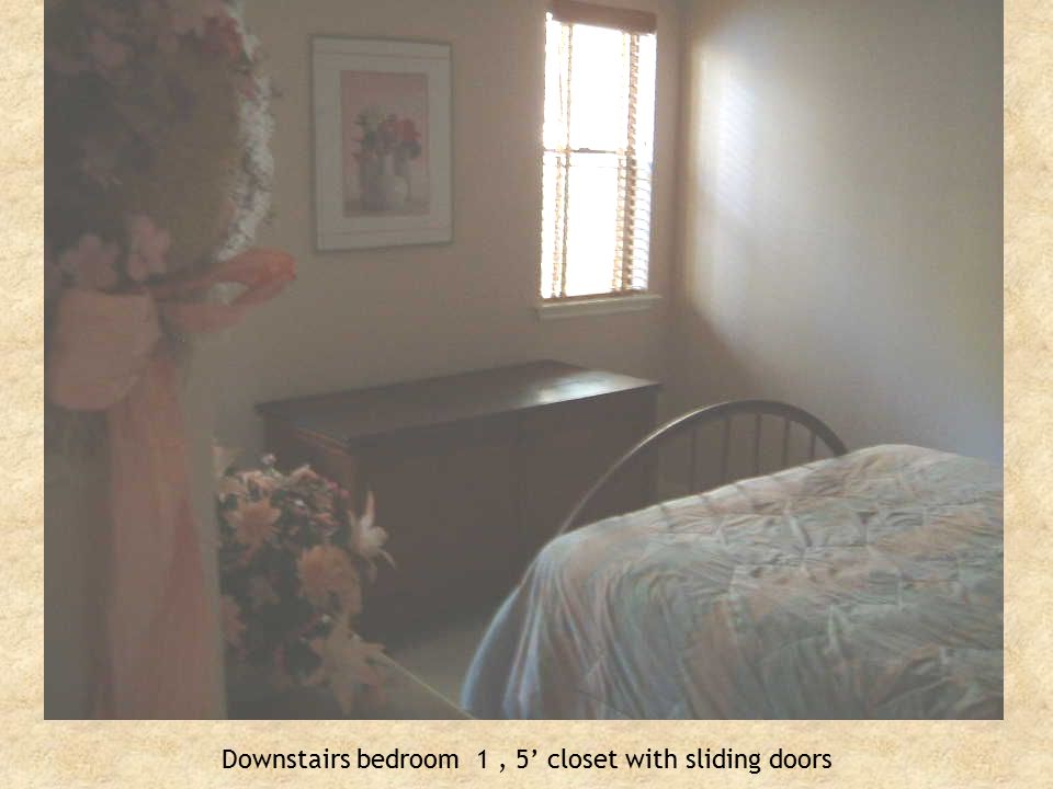 Downstairs bedroom 1, 5’ closet with sliding doors